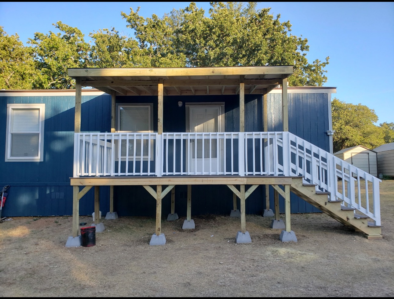 8 by 12 portable wood deck with white railing